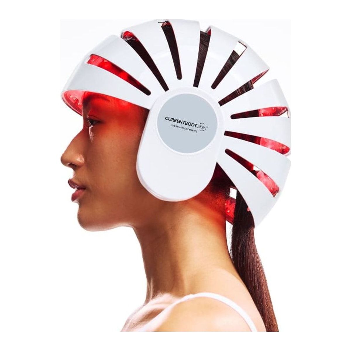 Side view of a woman wearing the CurrentBody LED hair growth helmet.