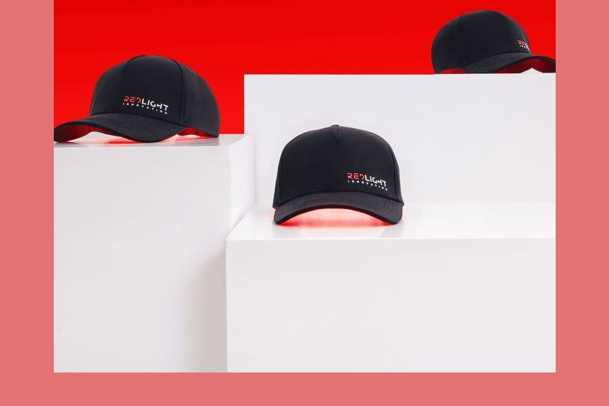 Three views of the RedLight Innovation Hat Pro: the LED panel, the inside of the cap, and the cap from above.